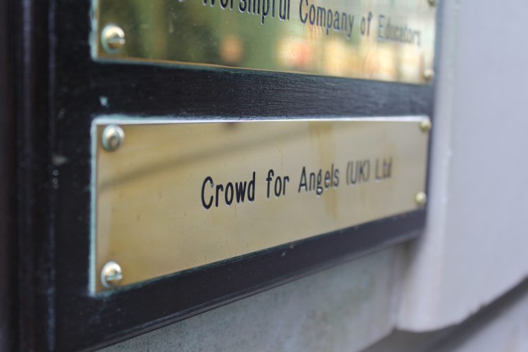 Crowd for Angels Sign